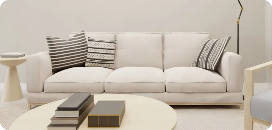 イメージ写真：白いソファーと丸いローテーブルが写っています